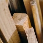 A vertical close-up shot of textured wooden planks showcasing natural patterns.
